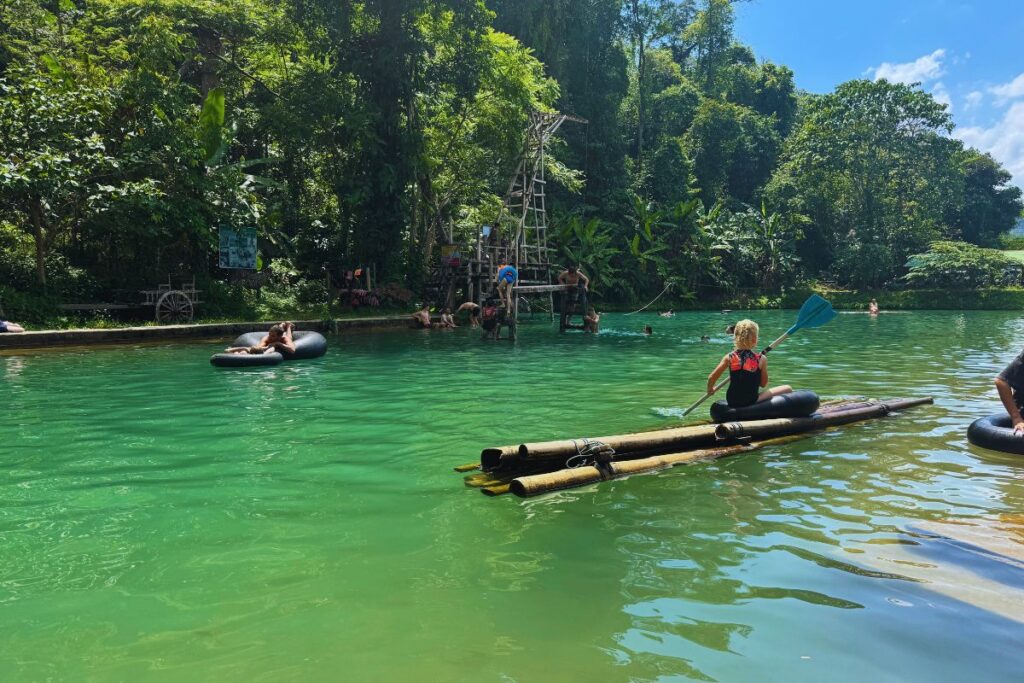 girl kayaking on a lagoon