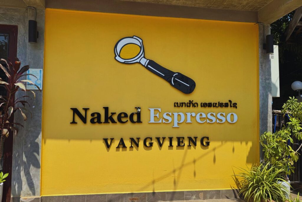 cafe sign with yellow background