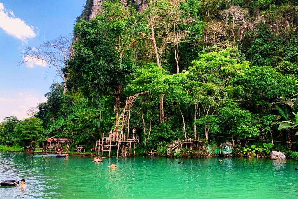 rope swing and zip line into the lagoon