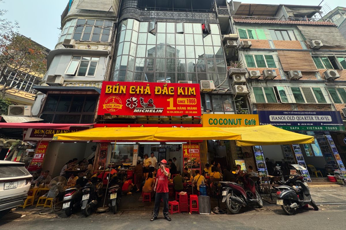 Bun Cha restaurant with outdoor seating up to the street