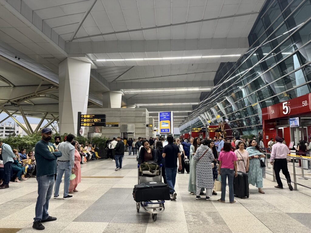 lots of people in an airport terminal