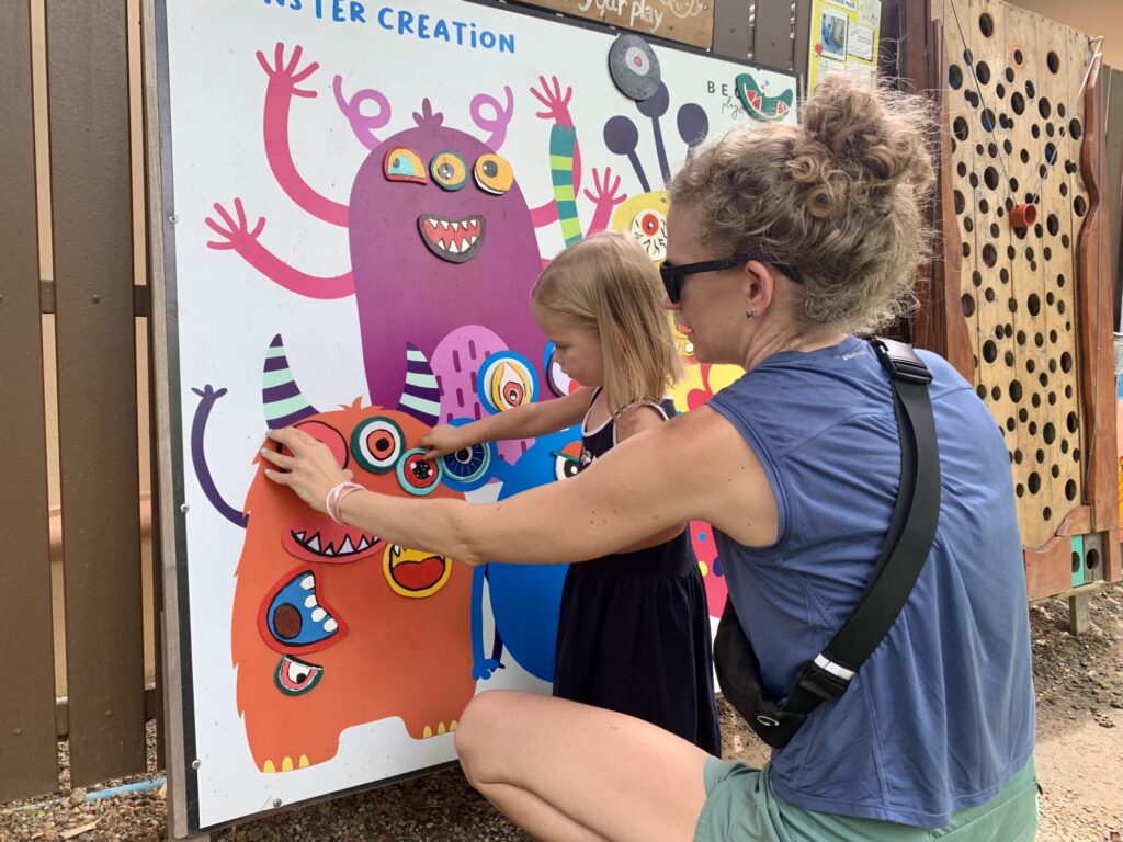 girl and mother creatively playing