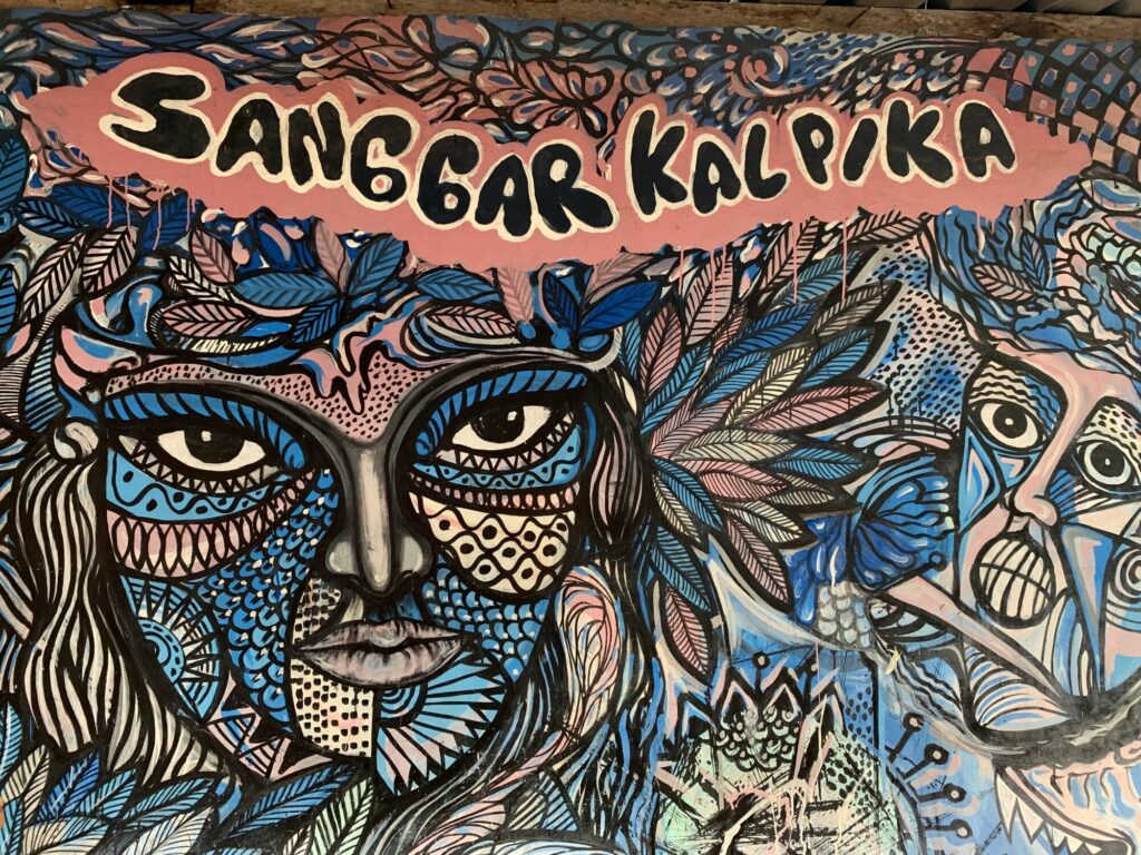 street art with tribal like faces