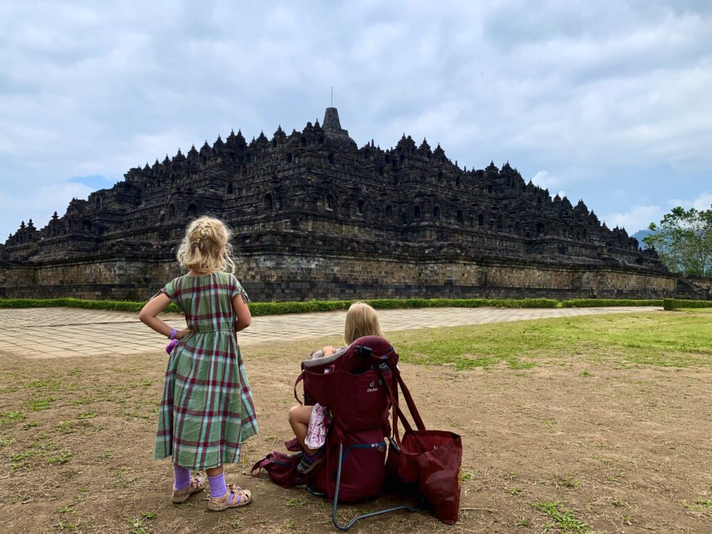 two girls looking at the world's largest Buddhist Temple