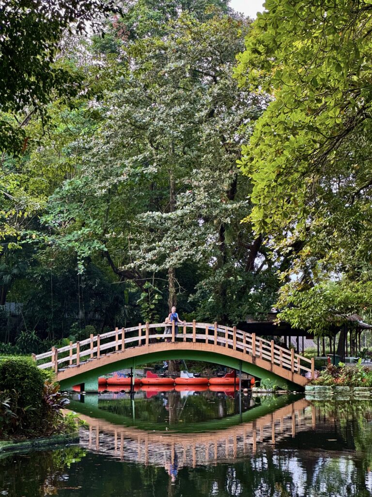 bridge over water with mirrored reflection