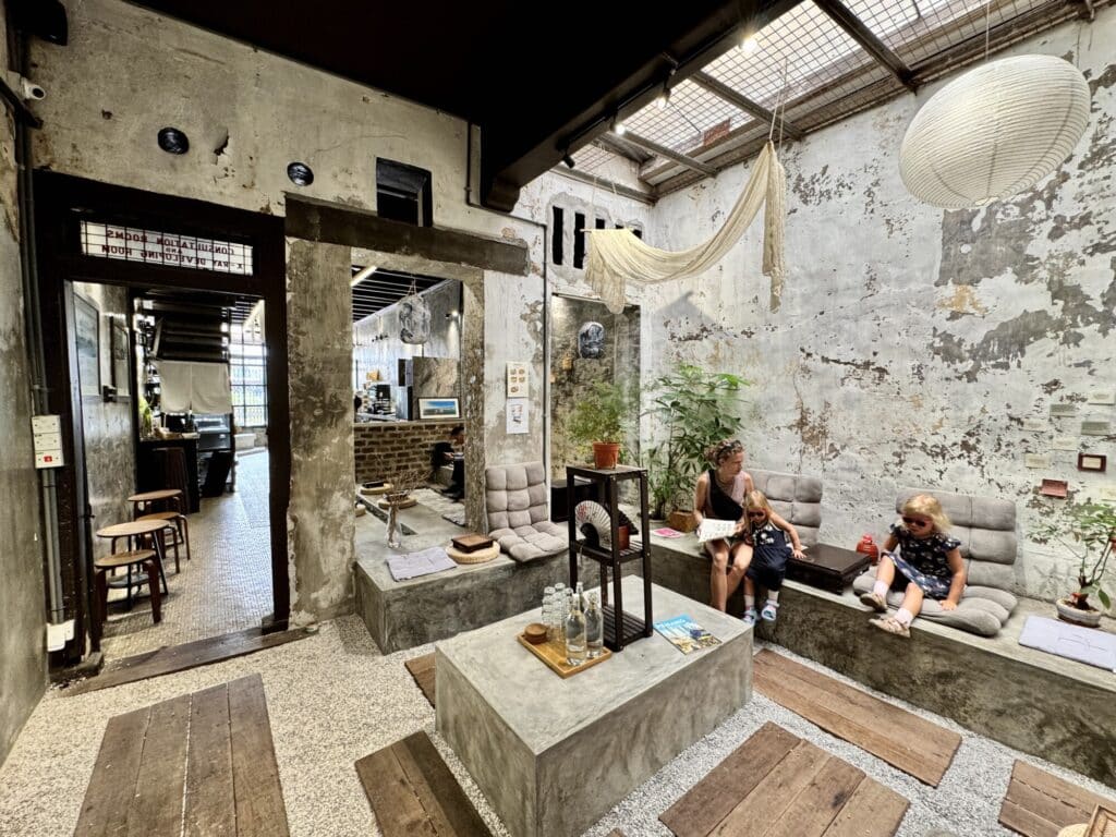 a family sitting in a beautifully decorated cafe