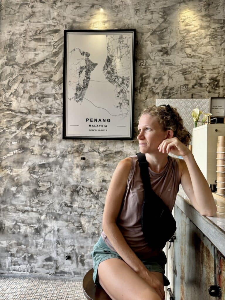 person posing infront of a Penang, Malaysia sign