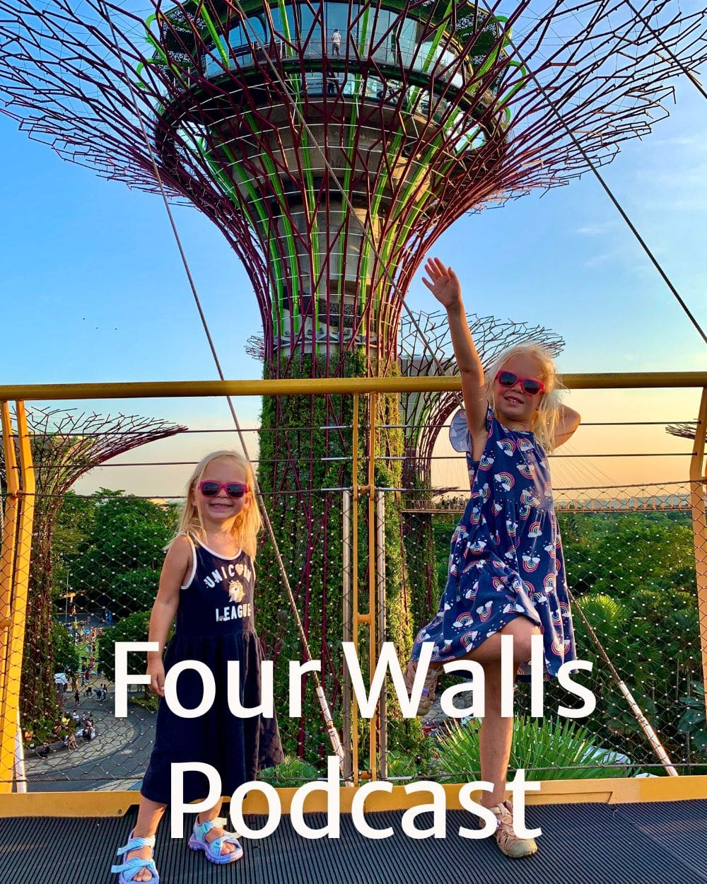 two girls standing in front of a famous Singapore landmark