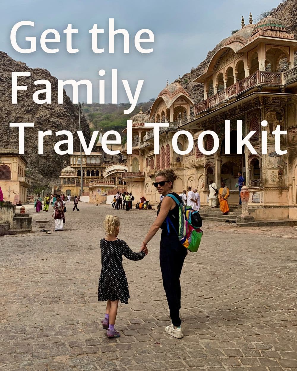 girl and mom at a desert looking temple complex