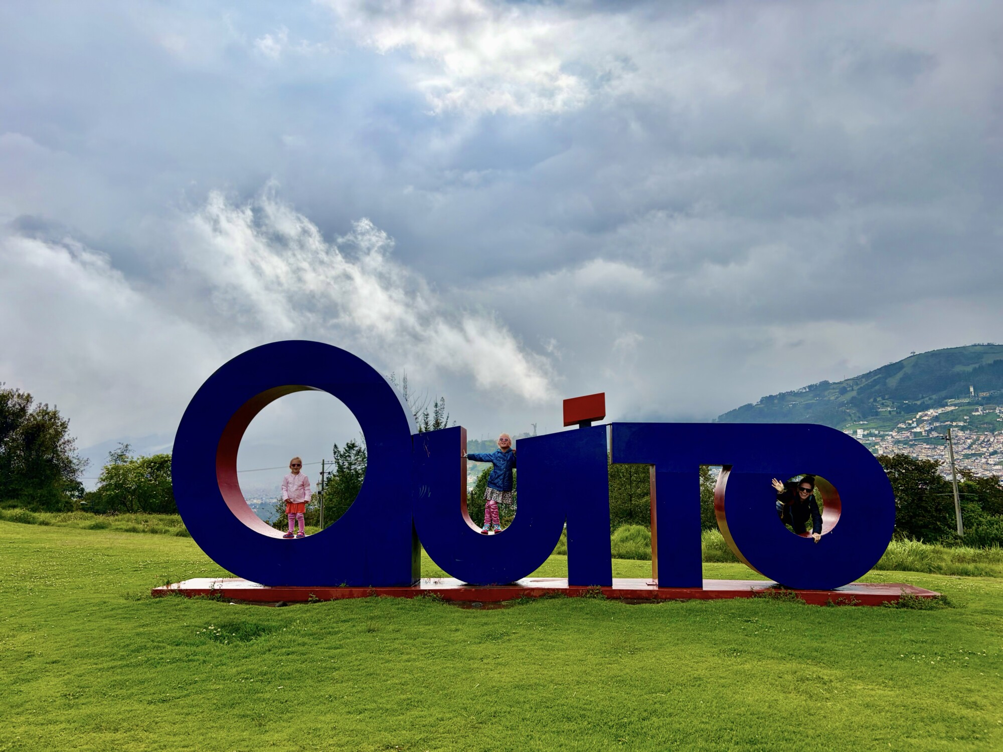 a sign with people posing