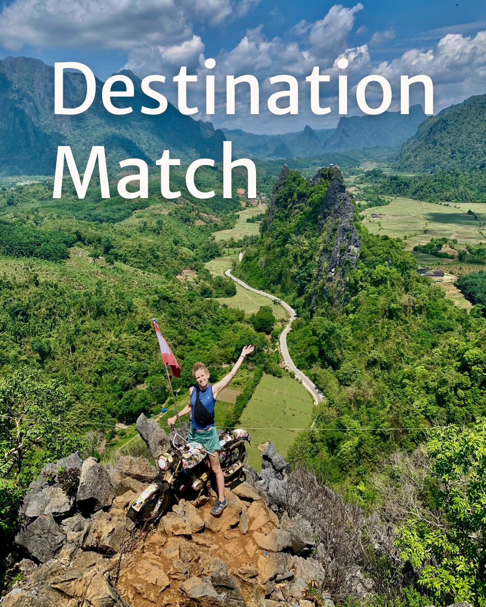 woman on a motorbike that is placed on a top of a mountain