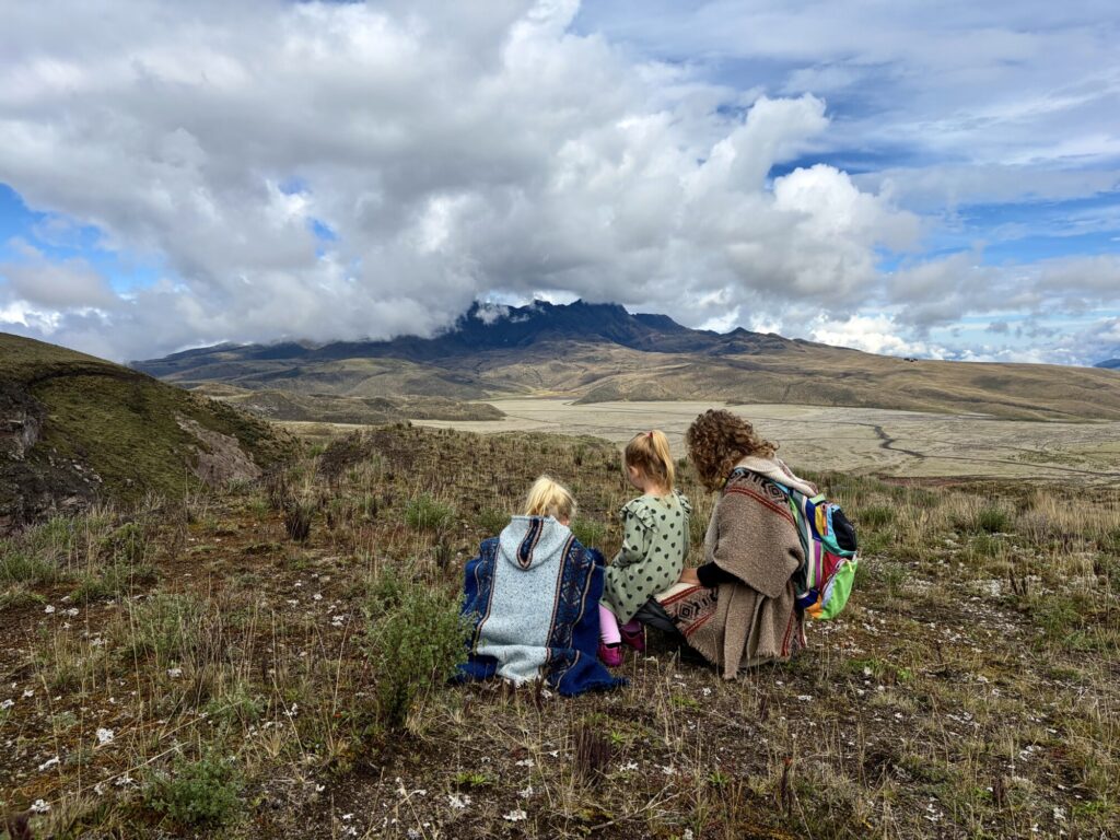 three people sitting in a national park