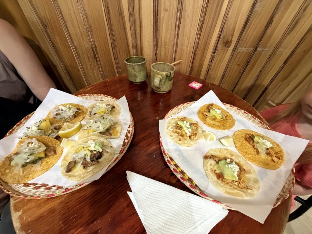 a two dish platter of street style tacos