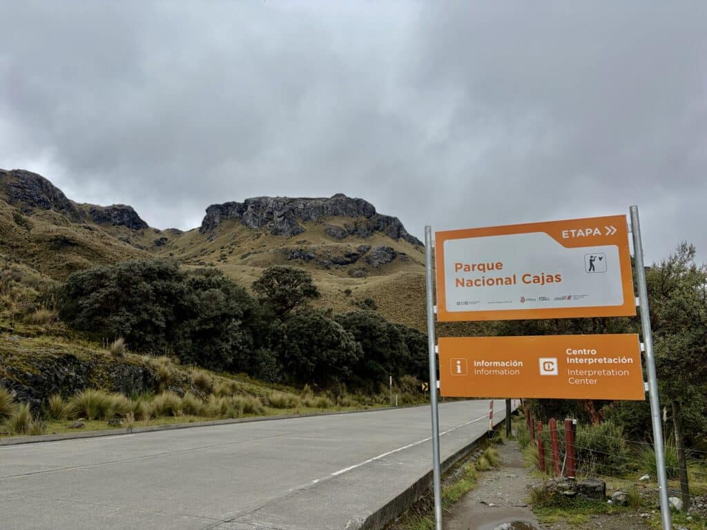 a sign to th entrance of a national park