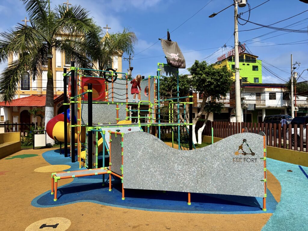 a kids playground in the shape of a pirate ship